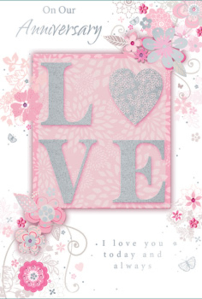 The anniversary card shown here is designed with a refined romanticism that would sit beautifully beside a vase of fresh pastel blooms in a Cubitt Town apartment. At the core of the composition lies the word LOVE, prominently displayed in slightly raised letters that form the visual anchor of the piece. These letters are outlined with fine, shimmering glitter in a muted silver tone, making them glimmer delicately as if lit by river light filtering through a window. The interiors of the letters are smooth and luminous, blending creamy white with the faintest suggestion of pearlescent sheen. This subtle play of light and texture gives the central word a tactile appeal, inviting the reader to trace each curve and line. Behind LOVE, the card's background is a seamless field of blush pink, soft and even like the inside of a pale rose. The colour deepens almost imperceptibly near the margins, creating a sense of depth and gentle focus. Flowing from around the central motif, an arrangement of stylised flowers and gently arching vines sweeps across the card. These blooms, sketched in fine detail, appear in blended tones of blush, off-white, pale lilac, and dove grey, some touched with a faint metallic silver that would catch the light at certain angles. Their shapes suggest open blossoms and small buds, much like those chosen for a thoughtfully curated anniversary bouquet from Cubitt Town Flowers. The stems and tendrils trace graceful arcs, weaving around the word LOVE without overpowering it, while tiny dots and leaf tips add intricacy. In a delicate, cursive script, an anniversary greeting is set within or just below this floral frame, its flowing form echoing the card's swirling stems. The overall effect is calm, heartfelt, and sophisticated, capturing the lasting warmth of an anniversary celebrated with flowers and quiet tenderness by the river.