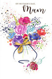 This Mother's Day card radiates the joyful exuberance of a freshly gathered bouquet, painted in swirling watercolour tones that echo the shifting light along the Thames in Cubitt Town. The flowers appear lush and generous, their forms loosely defined in purples, pinks, rich reds, and serene blues that blend and overlap in soft, fluid transitions. Each bloom seems to pulse with colour, darker at the centre and fading to gentle edges, giving the sense of petals curving outward into space. Here and there, delicate strokes and tiny specks of gold shimmer across the petals and leaves, catching attention like distant city lights reflected in the river at dusk. The arrangement is cradled in a rounded vase, painted with understated washes so as not to compete with the vivid bouquet above, and tied with an elegant golden bow that evokes the rustle of ribbon and tissue paper at a busy local florist. Around the central cluster, flecks of pigment and small hearts scatter lightly, mimicking petals tossed in celebration or the cheerful clutter of handmade cards spread across a family table on Mother's Day. Despite its flat surface, the artwork feels dynamic and layered, as if stems twist behind one another and blooms lean gently toward the viewer. The overall composition is airy yet heartfelt, conveying warmth, gratitude, and the quiet happiness of gifting flowers to a beloved mum. It captures not only the look of a spring bouquet, but the emotion of bringing that bouquet home through the streets of E14, arms full of colour and appreciation.